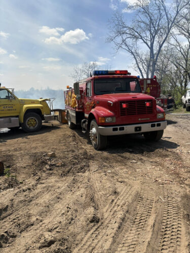 Firefighters battle blaze in ravine